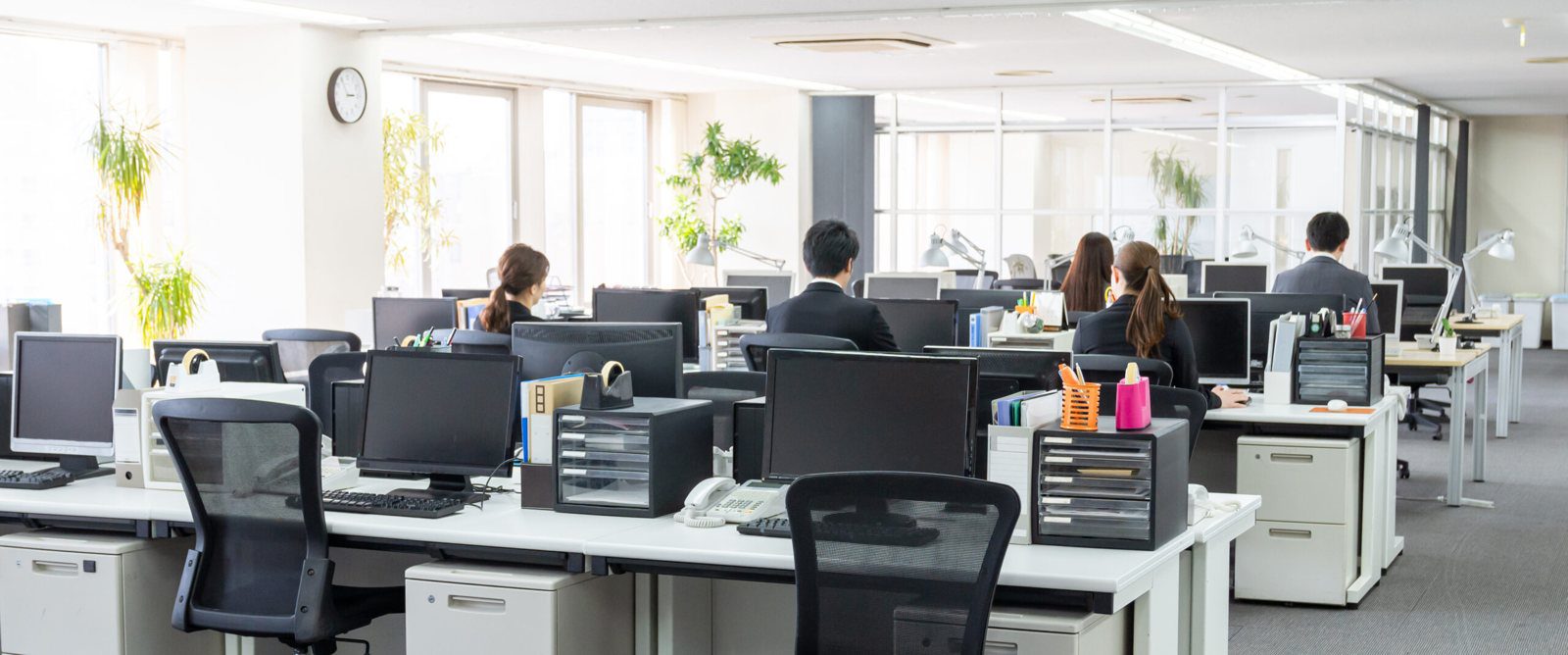 Open office with staff working at their desks